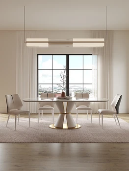 Легкий роскошный обеденный стол из каменной доски, современная простая прямоугольная комбинация обеденного стола и стула высокого класса во французском кремовом стиле